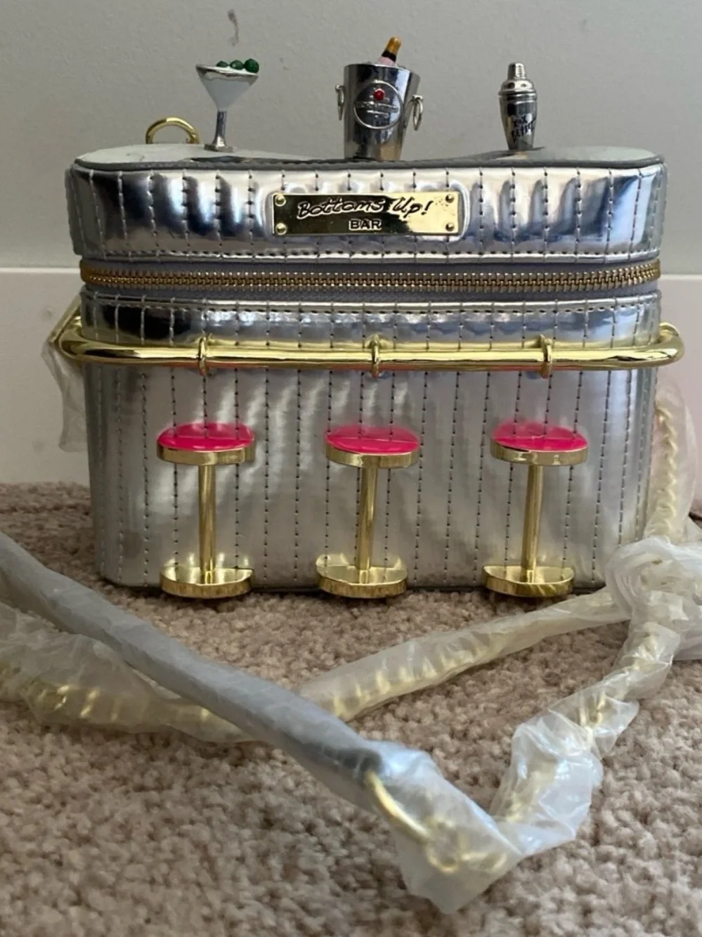 Betsey Johnson Silver Cocktail Bar Crossbody with Pink Seat Accents